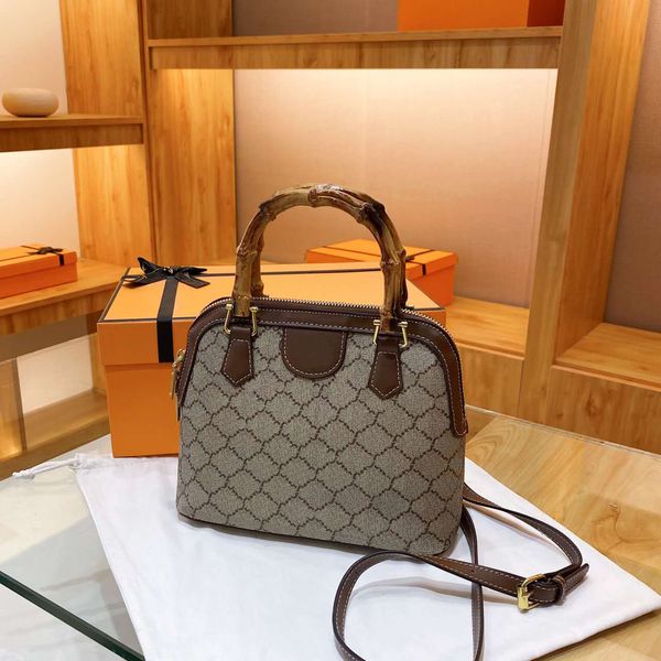 classic designer ophidia handbags women shoulder crossbody bags bamboo handle tote shopping messenger satchel vintage handbag fashion shell
classic designer ophidia handbags women shoulder crossbody bags bamboo handle tote shopping messenger satchel vintage handbag fashion shell