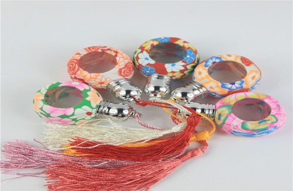 50pcslot round shape fimo clay perfume bottles glass rollon bottles for essential oils tassels glass perfume bottle whole9920725
50pcslot round shape fimo clay perfume bottles glass rollon bottles for essential oils tassels glass perfume bottle whole9920725