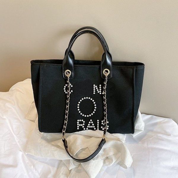 2023 new designer shopping bags handbags pearl beach bag canvas portable high-capacity fashion trend women crossbody bag
2023 new designer shopping bags handbags pearl beach bag canvas portable high-capacity fashion trend women crossbody bag