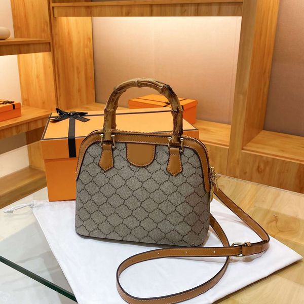bamboo handle handbag ophidia series shell bag double printing canvas woman shoulder bags messenger female bag purses women handbags designe
bamboo handle handbag ophidia series shell bag double printing canvas woman shoulder bags messenger female bag purses women handbags designe