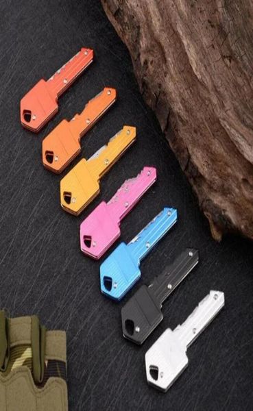 7 colors mini folding knife keychain outdoor gadgets key shape pocket fruit knifes multifunctional tool key chain saber swiss self2936358, Silver
7 colors mini folding knife keychain outdoor gadgets key shape pocket fruit knifes multifunctional tool key chain saber swiss self2936358, Silver
