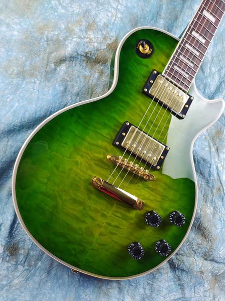 custom electric guitar peach blossom wood body and neck rosewood fingerboard jade green large flower veneer in stock quick mail package
custom electric guitar peach blossom wood body and neck rosewood fingerboard jade green large flower veneer in stock quick mail package