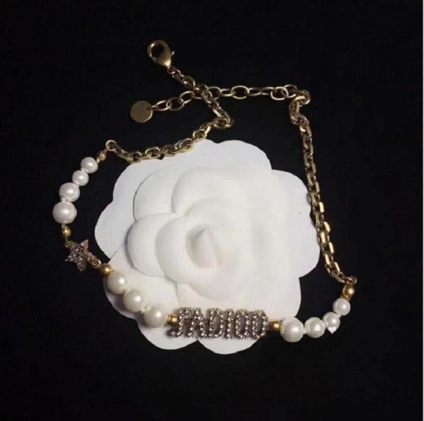 2021 chain alloy electroplate branded letters pearl stars zirconia studded necklaces and bracelets with packaging3093651, Silver
2021 chain alloy electroplate branded letters pearl stars zirconia studded necklaces and bracelets with packaging3093651, Silver