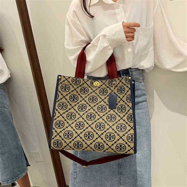 handbag 2023 new bag portable canvas women's shoulder messenger printed letter college student tote
handbag 2023 new bag portable canvas women's shoulder messenger printed letter college student tote