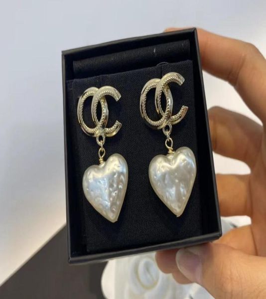 white pearl heart charm earrings bright copper material personalized shape brand fashion classic luxury earrings designer for w6647183, Golden
white pearl heart charm earrings bright copper material personalized shape brand fashion classic luxury earrings designer for w6647183, Golden