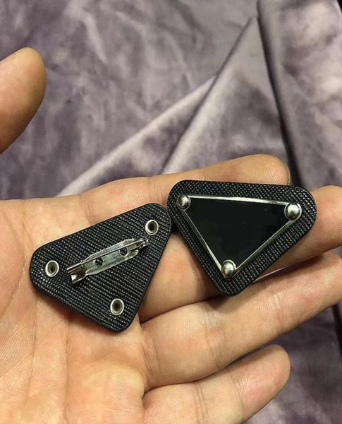 2846cm leather metal triangle brooch women letter brooches suit lapel pin fashion jewelry accessories9300725, Gray 
2846cm leather metal triangle brooch women letter brooches suit lapel pin fashion jewelry accessories9300725, Gray