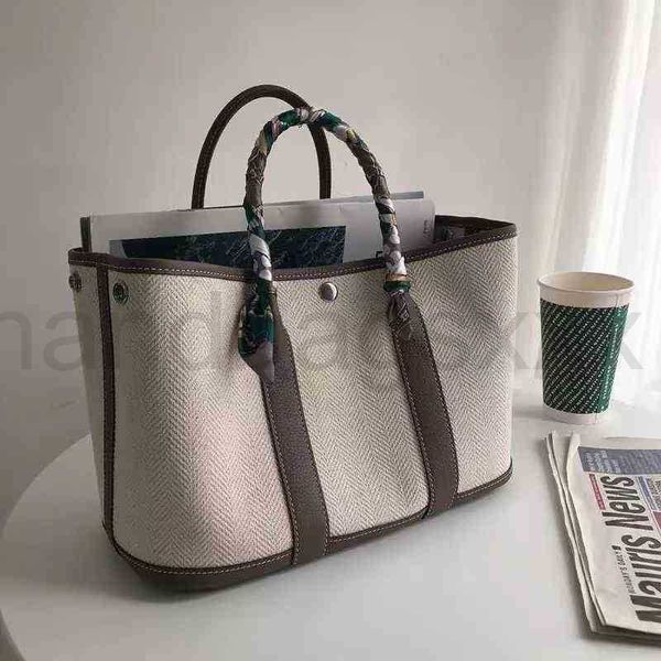 large capacity new canvas with cowhide head bag garden party casual hand one-shoulder color slant tote
large capacity new canvas with cowhide head bag garden party casual hand one-shoulder color slant tote
