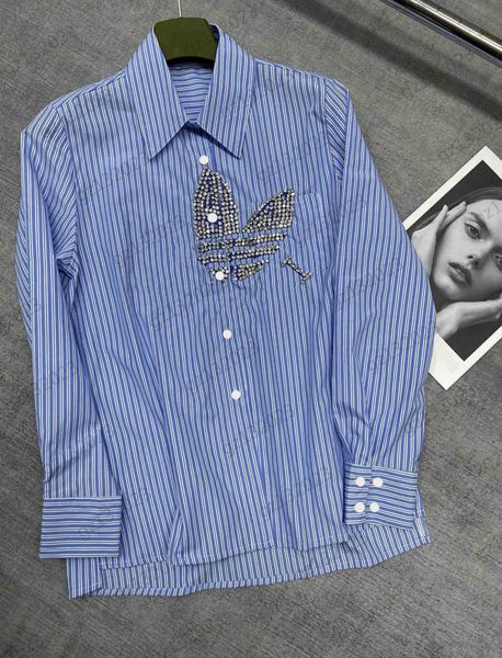 luxury blouses fashion brand co-branded style drill logo lapel shirts custom cufflinks long sleeve vertical print slimming blouses womens de, White
luxury blouses fashion brand co-branded style drill logo lapel shirts custom cufflinks long sleeve vertical print slimming blouses womens de, White