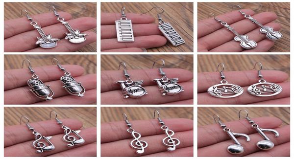 charm musical jewelry earrings musical note microphone drum guitar violin shaped dangle drop earrings for girls women3061667, Golden
charm musical jewelry earrings musical note microphone drum guitar violin shaped dangle drop earrings for girls women3061667, Golden