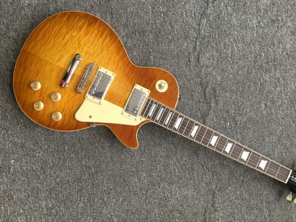 one piece of neck & body electric guitar, frets binding, tune-o-matic bridge, honey burst maple top
one piece of neck & body electric guitar, frets binding, tune-o-matic bridge, honey burst maple top