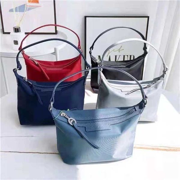 2023 high version longxiang bag underarm gift chain leather one shoulder handbag mini handheld small square for women
2023 high version longxiang bag underarm gift chain leather one shoulder handbag mini handheld small square for women