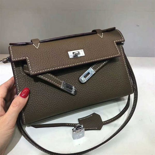kellies bag h bag fashionable lychee pattern cowhide bag layer cowhide women's bag silver buckle handbag single shoulder messenger bag
kellies bag h bag fashionable lychee pattern cowhide bag layer cowhide women's bag silver buckle handbag single shoulder messenger bag