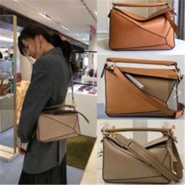 high-end leather designer handbag women's bag 2023 new leather puzzle geometry mini portable splicing single shoulder diagonal pillow
high-end leather designer handbag women's bag 2023 new leather puzzle geometry mini portable splicing single shoulder diagonal pillow