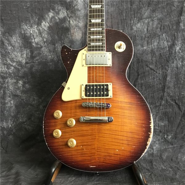 left hand tiger flame electric guitar. sunburst color guitar.relics. musical instrument guitar
left hand tiger flame electric guitar. sunburst color guitar.relics. musical instrument guitar