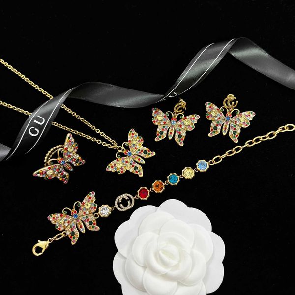 2023 designer new double letter temperament candy color necklace ujia personality full diamond bracelet g family earring ring, Silver
2023 designer new double letter temperament candy color necklace ujia personality full diamond bracelet g family earring ring, Silver