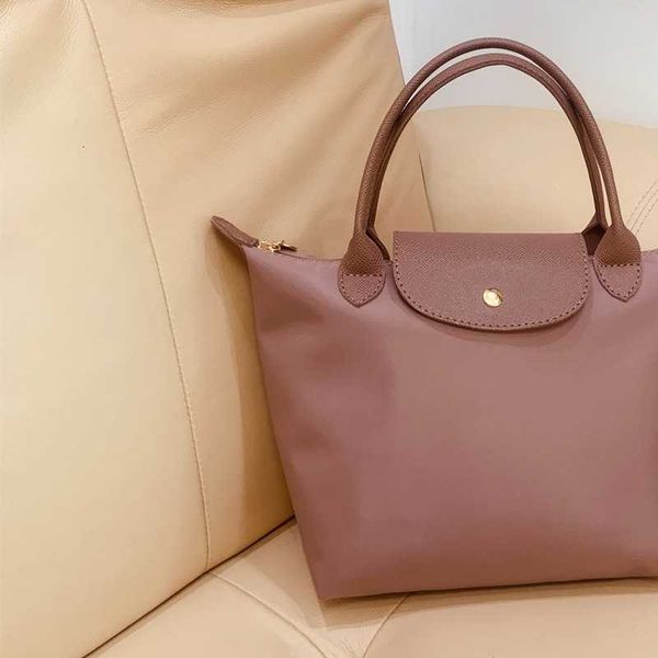 dragon-inlaid large-capacity nylon tote bag waterproof cross-body one-shoulder commuting light fashion versatile handbag
dragon-inlaid large-capacity nylon tote bag waterproof cross-body one-shoulder commuting light fashion versatile handbag