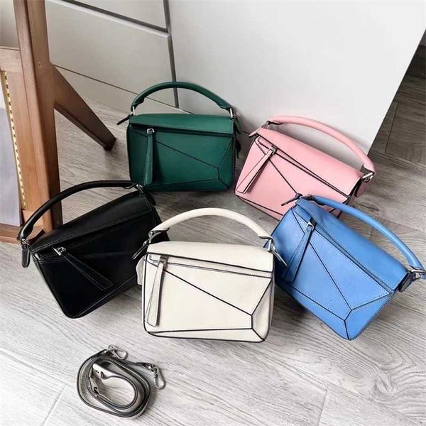 genuine leather bag 2023 new fashion geometric cowhide lingge crossbody women's spring handheld pillow
genuine leather bag 2023 new fashion geometric cowhide lingge crossbody women's spring handheld pillow