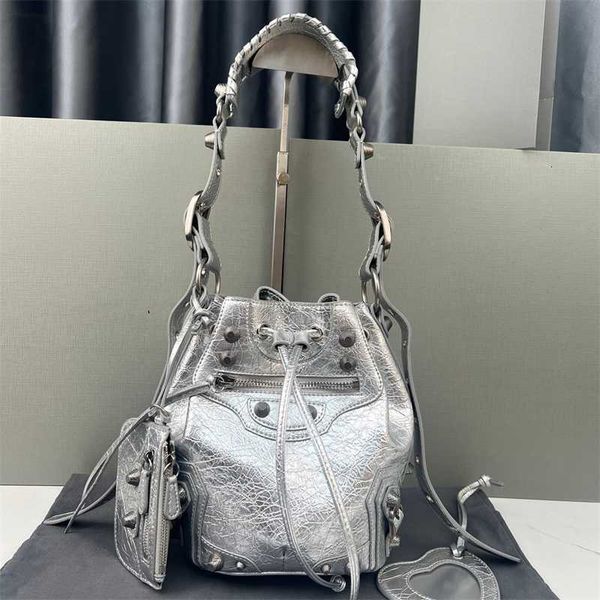 zhao lusi the same le cagole motorcycle bucket bag of family b punk style rivet three in one cross car underarm female
zhao lusi the same le cagole motorcycle bucket bag of family b punk style rivet three in one cross car underarm female