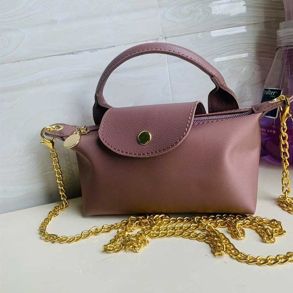 french hualong inlaid mini single-handle dumpling bag waterproof nylon leisure hand purse chain messenger
french hualong inlaid mini single-handle dumpling bag waterproof nylon leisure hand purse chain messenger