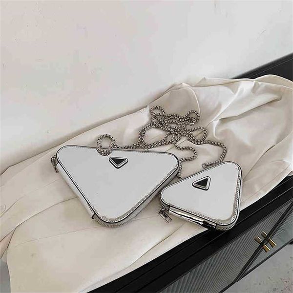 2023 designer bag 2023 spring new family net red mirror chain triangle single shoulder slant span bag small fashionable red bag
2023 designer bag 2023 spring new family net red mirror chain triangle single shoulder slant span bag small fashionable red bag