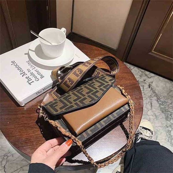 2023 designer bag handbag hands spring shoulder bag simple atmosphere chain
2023 designer bag handbag hands spring shoulder bag simple atmosphere chain