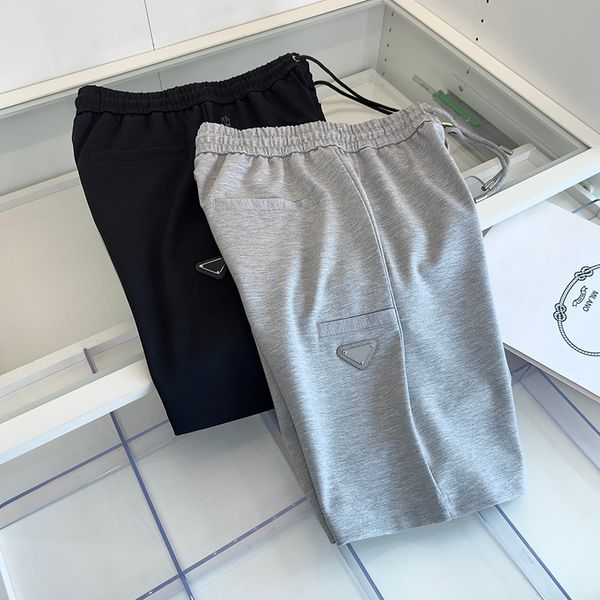 2023ss summer men's shorts classic versatile elastic waist triangle pocket decorated casual capris, White;black
2023ss summer men's shorts classic versatile elastic waist triangle pocket decorated casual capris, White;black