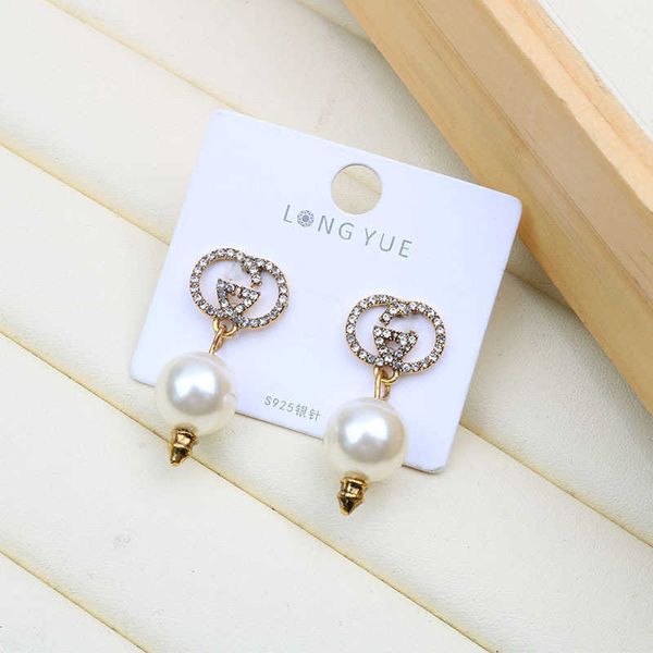2023 designer new pearl strawberry bronze tassel back hanging long temperament net red s925 silver needle tide round face earrings, Golden
2023 designer new pearl strawberry bronze tassel back hanging long temperament net red s925 silver needle tide round face earrings, Golden