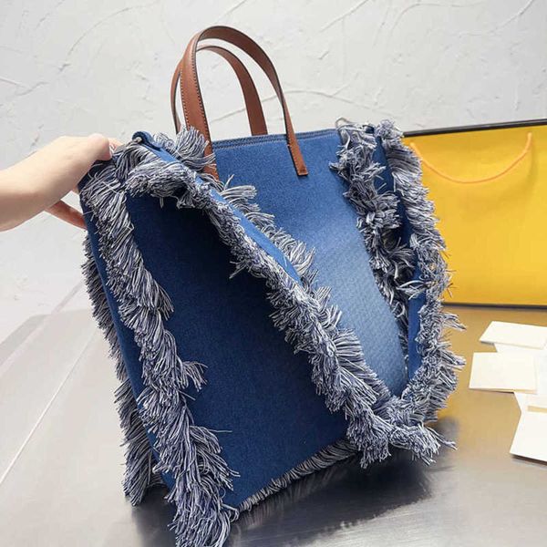 designer bags womens tote bag cowboy handbags fashion tassels shoulder purses women large luxury totes bags letters printing 221114
designer bags womens tote bag cowboy handbags fashion tassels shoulder purses women large luxury totes bags letters printing 221114
