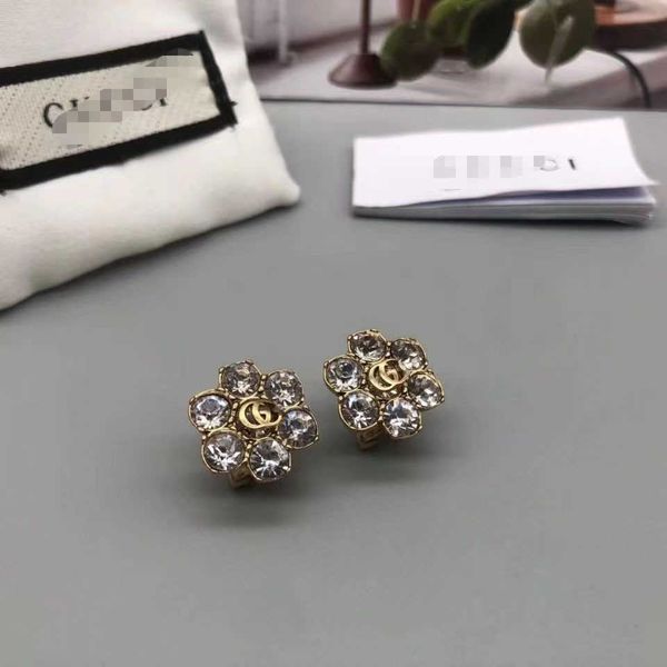 2023 designer new diamond inlaid double g letter flower earrings silver needle simple temperament personality network red woman, Golden
2023 designer new diamond inlaid double g letter flower earrings silver needle simple temperament personality network red woman, Golden