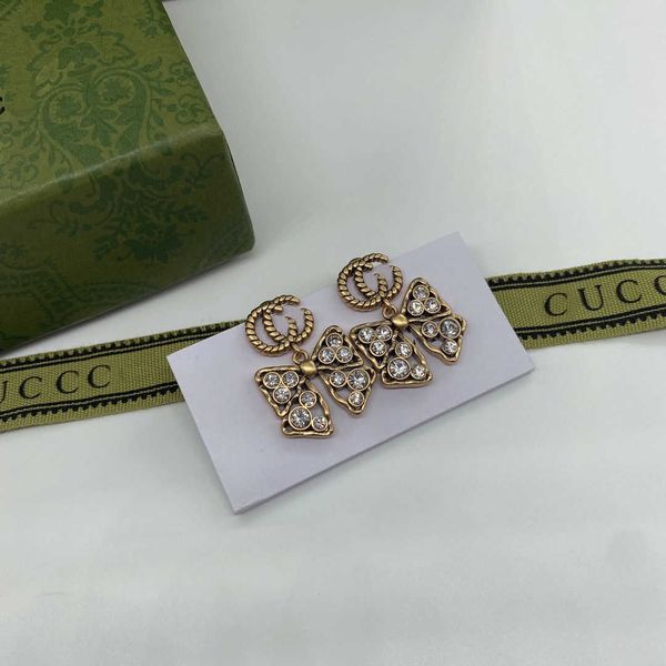 2023 designer new butterfly rhinestone double g letter fashion high sense of minority temperament earrings female, Golden
2023 designer new butterfly rhinestone double g letter fashion high sense of minority temperament earrings female, Golden