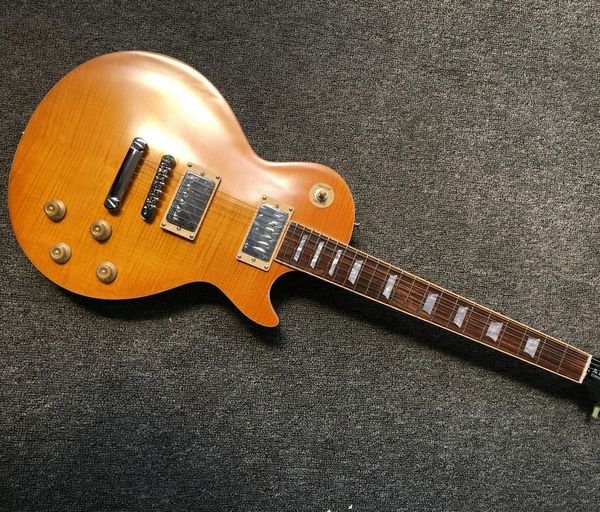 one piece neck one piece body electric guitar in yellow ,upgrade tune-o-matic bridge guitar tiger flame guitar yellow
one piece neck one piece body electric guitar in yellow ,upgrade tune-o-matic bridge guitar tiger flame guitar yellow