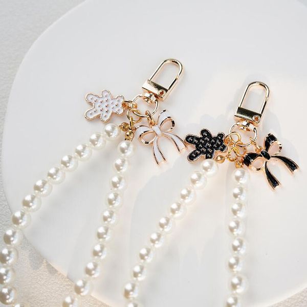 pearl chain pendant metal keychains flower clothers loves styles pearls keychain car bag fashion oranment accessories gift, Silver
pearl chain pendant metal keychains flower clothers loves styles pearls keychain car bag fashion oranment accessories gift, Silver