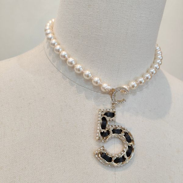 luxury quality charm pendant necklace with diamond and nature shell beads black genuine leather have box stamp ps7745a, Golden
luxury quality charm pendant necklace with diamond and nature shell beads black genuine leather have box stamp ps7745a, Golden
