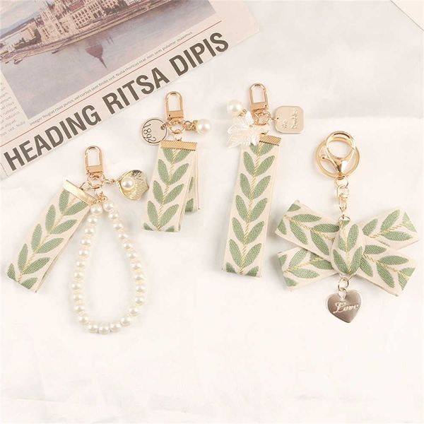 key rings fashion fresh leaf stripe key ring embroidery alloy pearl pendant heart charm keychain women bag car ornament couple gift aa230329, Slivery;golden
key rings fashion fresh leaf stripe key ring embroidery alloy pearl pendant heart charm keychain women bag car ornament couple gift aa230329, Slivery;golden