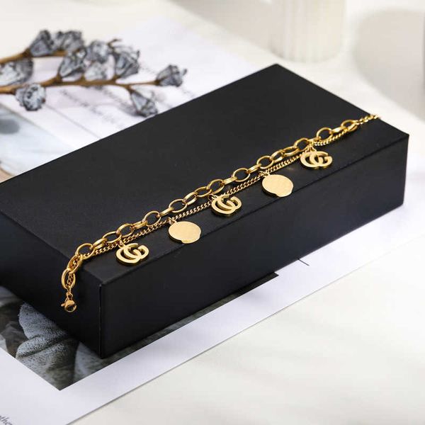 double-letter titanium plated with 14k real gold double-layer thick chain style high-grade stainless steel bracelet, Black
double-letter titanium plated with 14k real gold double-layer thick chain style high-grade stainless steel bracelet, Black