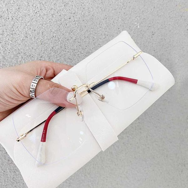 designer glasses new frameless edge cutting blue light glasses net red plain color matching two legs myopia frame, White;black
designer glasses new frameless edge cutting blue light glasses net red plain color matching two legs myopia frame, White;black
