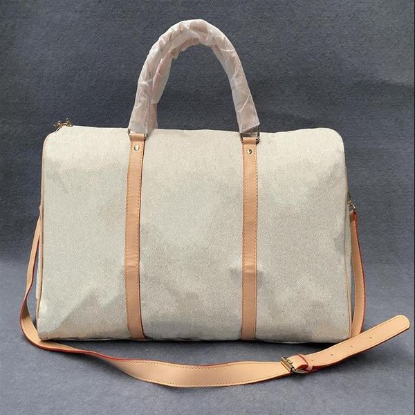 2022 luxury fashion men women travel bag duffle bags brand designer pu leather luggage handbags large capacity sport bag with lock316d
2022 luxury fashion men women travel bag duffle bags brand designer pu leather luggage handbags large capacity sport bag with lock316d