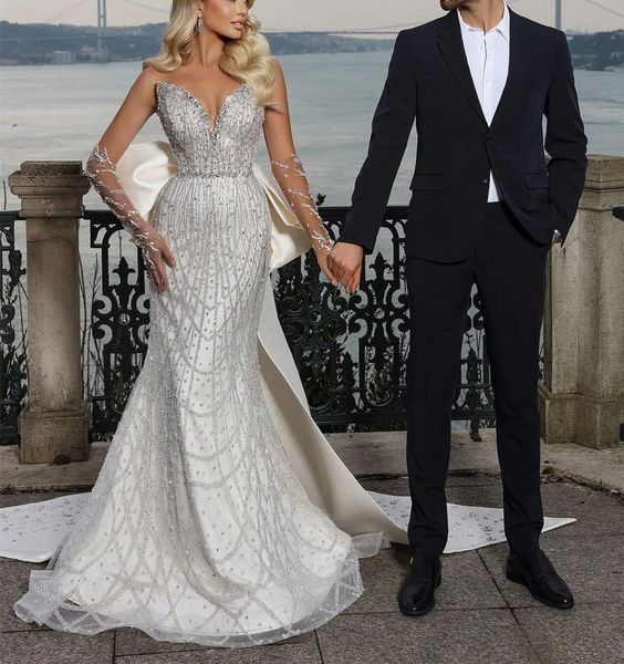 sparkly mermaid wedding dresses long sleeves v neck appliques sequins beaded ruffles satin bow knot 3d lace floor length bridal gowns custom, White
sparkly mermaid wedding dresses long sleeves v neck appliques sequins beaded ruffles satin bow knot 3d lace floor length bridal gowns custom, White