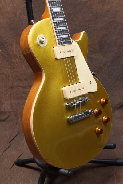 factory promotion gold 1956 electric guitar wrap around tailpiece, white p 90 pickups, china oem music instrument369
factory promotion gold 1956 electric guitar wrap around tailpiece, white p 90 pickups, china oem music instrument369