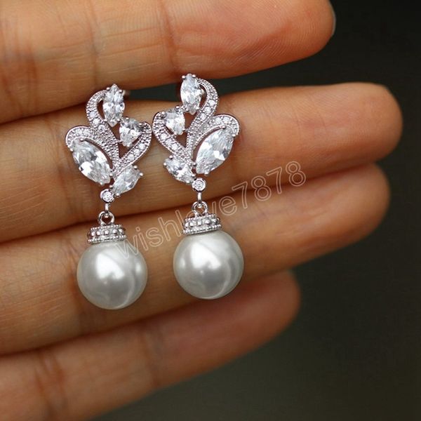 elegant imitation pearl dangle earrings elegant women party accessories high-quality silver color fresh statement jewelry
elegant imitation pearl dangle earrings elegant women party accessories high-quality silver color fresh statement jewelry