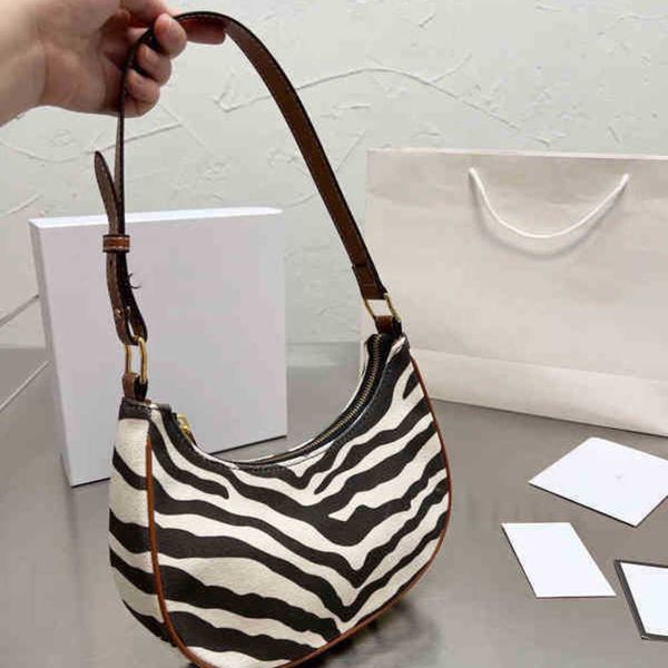 bags women fashion zebra handbag shoulder leather designer crossbody female underarm purses 220302
bags women fashion zebra handbag shoulder leather designer crossbody female underarm purses 220302