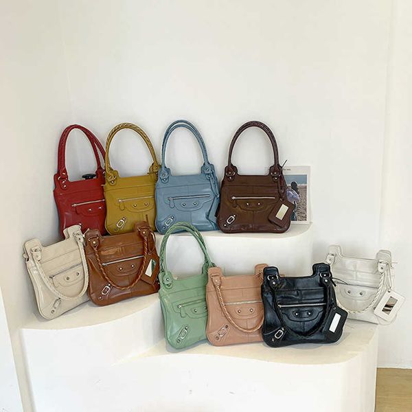 new heavy industry rivet locomotive bag large capacity underarm bag one shoulder handbag female
new heavy industry rivet locomotive bag large capacity underarm bag one shoulder handbag female