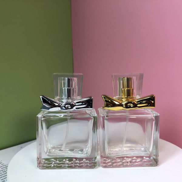 100pcs/lot 30ml bowknot glass spray perfume bottle refillable empty bottle gold silver automizer
100pcs/lot 30ml bowknot glass spray perfume bottle refillable empty bottle gold silver automizer