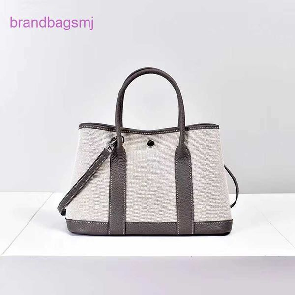 original designer handbags hermm h2023 new layer cow leather with linen canvas garden tote hand messenger
original designer handbags hermm h2023 new layer cow leather with linen canvas garden tote hand messenger