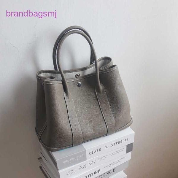original designer handbags hermm all season versatile casual cowhide portable garden on the first floor large capacity full leather female i
original designer handbags hermm all season versatile casual cowhide portable garden on the first floor large capacity full leather female i