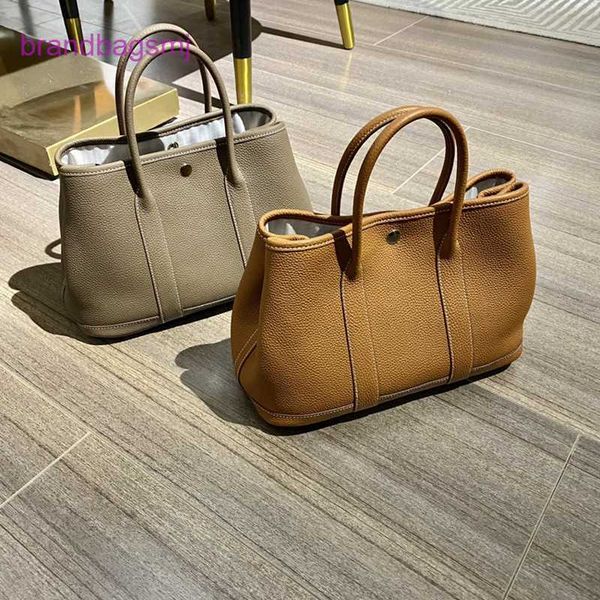 original designer handbags hermm new cowhide garden large capacity shopping versatile one-shoulder tote
original designer handbags hermm new cowhide garden large capacity shopping versatile one-shoulder tote