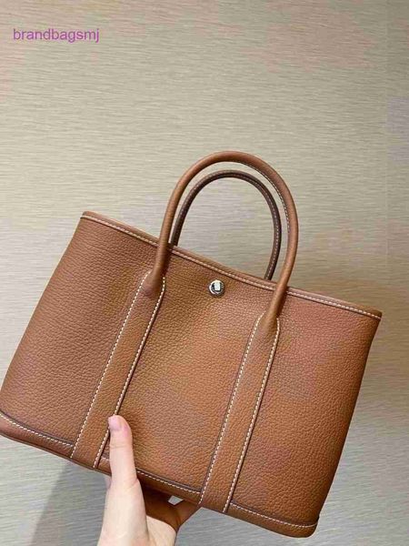 original designer handbags hermm handmade wax thread garden togo cowhide business hand commuter women's tote
original designer handbags hermm handmade wax thread garden togo cowhide business hand commuter women's tote