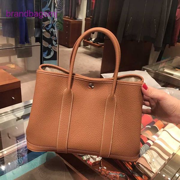 original designer handbags hermm 2023 new cowhide women's bag single-shoulder skew straddle simple garden portable big shopping bucket
original designer handbags hermm 2023 new cowhide women's bag single-shoulder skew straddle simple garden portable big shopping bucket
