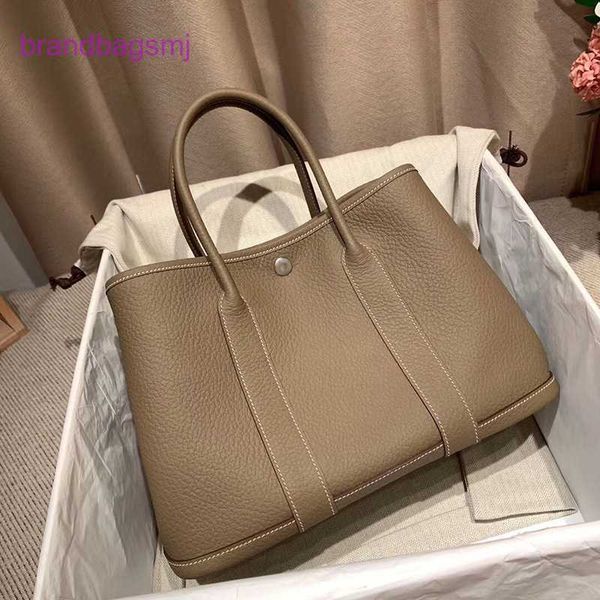 original designer handbags hermm new lychee grain layer cowhide garden women's shopping bucket large capacity single shoulder cross bod
original designer handbags hermm new lychee grain layer cowhide garden women's shopping bucket large capacity single shoulder cross bod