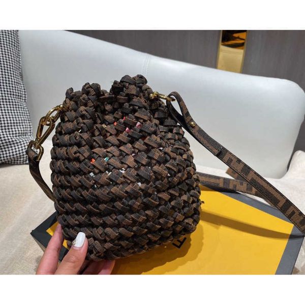handbag 21 autumn and winter new canvas bucket leisure woven hollow portable diagonal bag
handbag 21 autumn and winter new canvas bucket leisure woven hollow portable diagonal bag